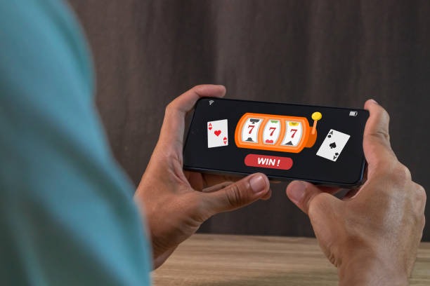 Joker Gaming slot interface showing game grid and bet controls